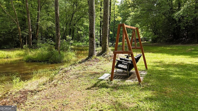 132 Wild Horse Cove Cir, Cleveland, GA 30528 - view of playground featuring a lawn