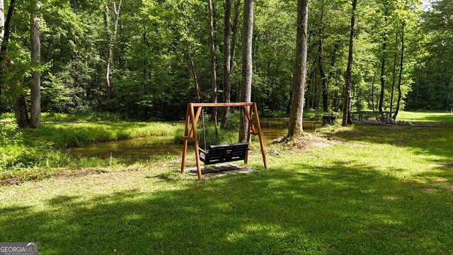 132 Wild Horse Cove Cir, Cleveland, GA 30528 - view of grassy yard featuring a wooded view