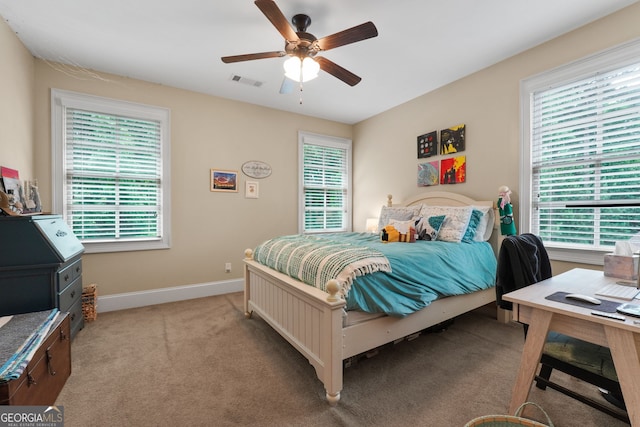 5130 Pratt St SW, Covington, GA 30014 - bedroom with light colored carpet, ceiling fan, and a desk