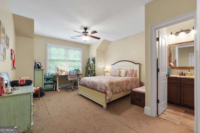5130 Pratt St SW, Covington, GA 30014 - bedroom with light colored carpet, ensuite bath, a desk, and ceiling fan