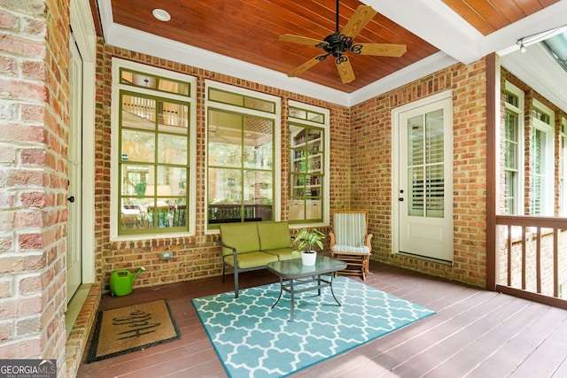 5130 Pratt St SW, Covington, GA 30014 - sunroom with ceiling fan, an outdoor living space, and beamed ceiling