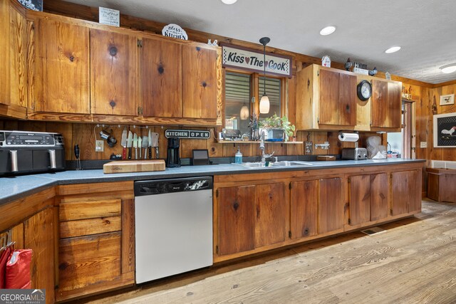 2296 Athens Rd, Royston, GA 30662 - kitchen with dishwasher, brown cabinetry, light wood-style floors, and recessed lighting