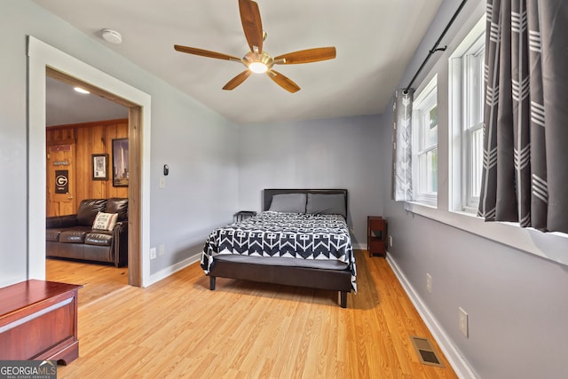 2296 Athens Rd, Royston, GA 30662 - bedroom with wood finished floors and a ceiling fan