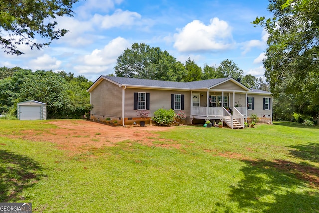 2296 Athens Rd, Royston, GA 30662 - single story home featuring crawl space, covered porch, a detached garage, an outdoor structure, and a front lawn