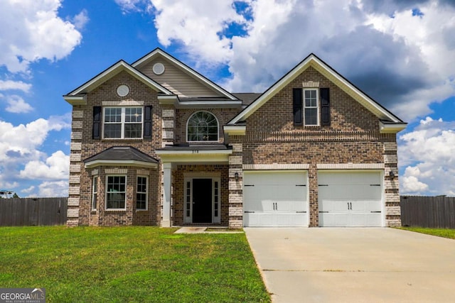 358 Brookhaven Loop NE, Ludowici, GA 31316 - traditional home featuring brick siding, concrete driveway, and a garage