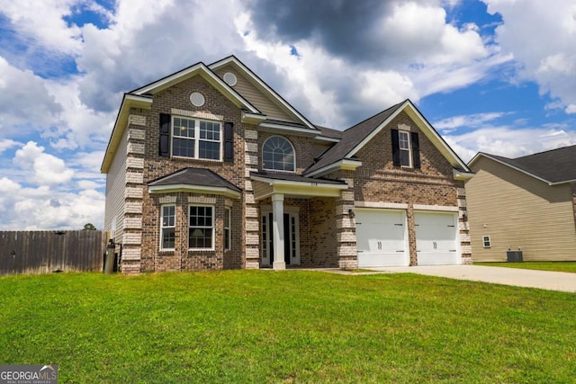 358 Brookhaven Loop NE, Ludowici, GA 31316 - view of front of house featuring brick siding, concrete driveway, and a garage