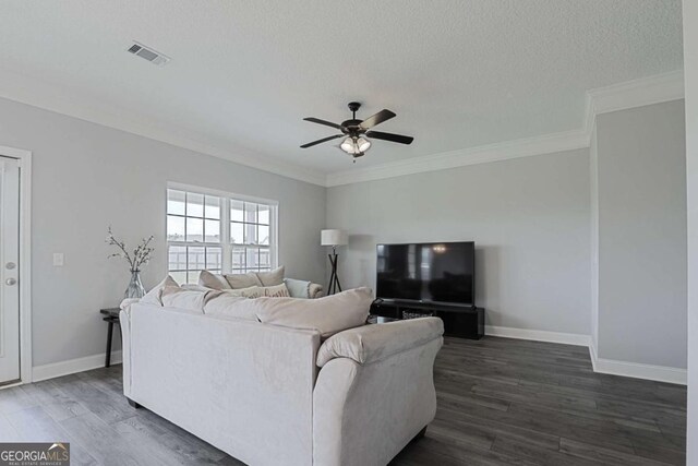 358 Brookhaven Loop NE, Ludowici, GA 31316 - living room with ceiling fan, wood finished floors, a textured ceiling, and crown molding