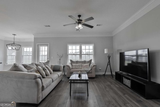 358 Brookhaven Loop NE, Ludowici, GA 31316 - living area with a ceiling fan, dark wood-style floors, ornamental molding, and a chandelier