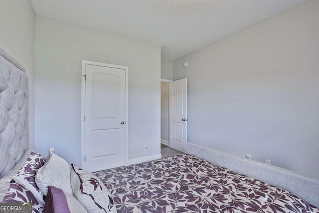 358 Brookhaven Loop NE, Ludowici, GA 31316 - bedroom with carpet and a textured ceiling