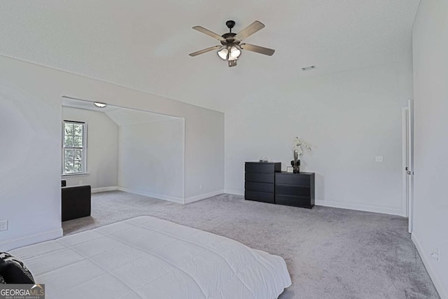 358 Brookhaven Loop NE, Ludowici, GA 31316 - bedroom with carpet flooring, vaulted ceiling, and a ceiling fan