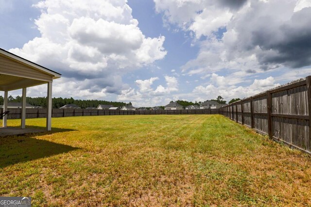 358 Brookhaven Loop NE, Ludowici, GA 31316 - view of fenced backyard