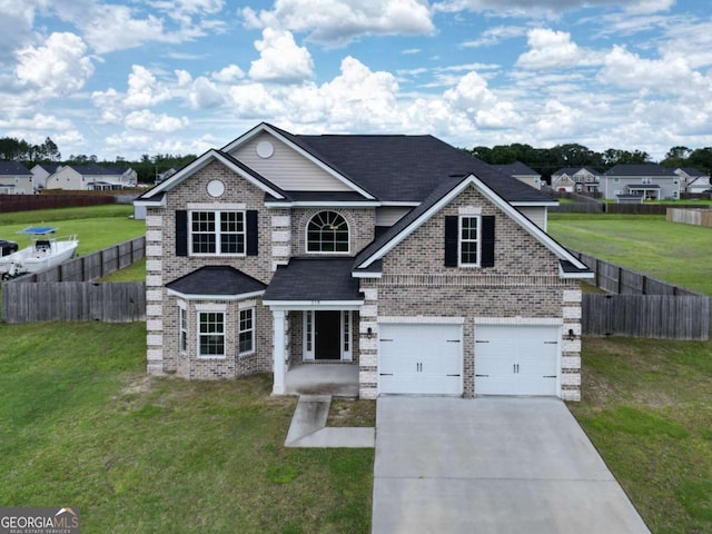 358 Brookhaven Loop NE, Ludowici, GA 31316 - traditional-style home featuring brick siding, driveway, an attached garage, and a shingled roof