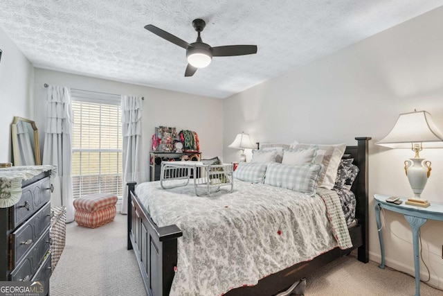 3115 Seven Pines Ct Unit 308, Atlanta, GA 30339 - bedroom featuring light carpet, a textured ceiling, and ceiling fan