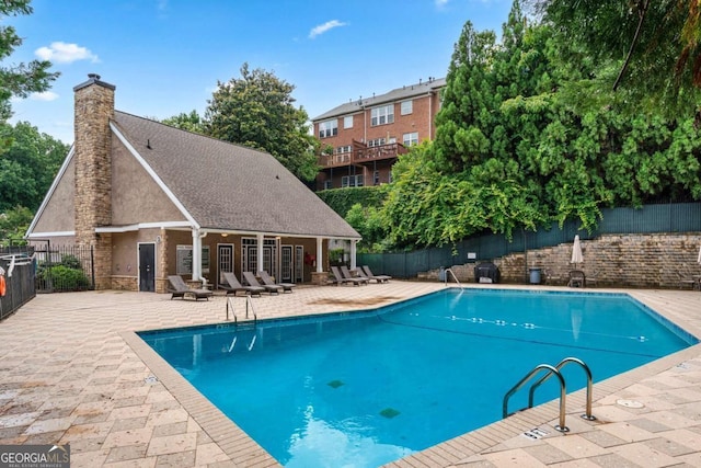 3115 Seven Pines Ct Unit 308, Atlanta, GA 30339 - community pool featuring a patio area