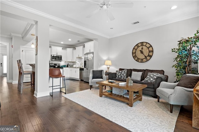 509 Mariners Cir, Saint Simons, GA 31522 - living room featuring a ceiling fan, dark wood finished floors, recessed lighting, and ornamental molding