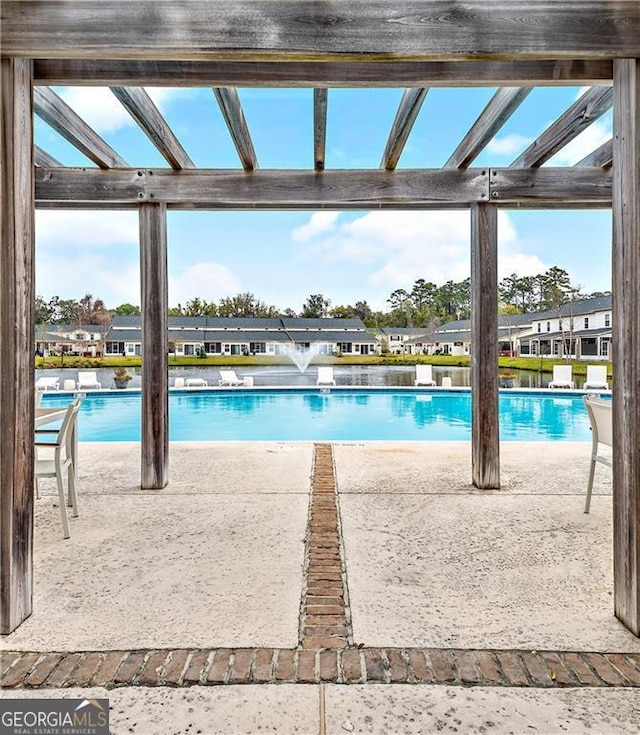 509 Mariners Cir, Saint Simons, GA 31522 - community pool with a patio area