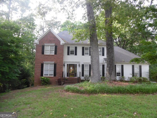 1205 Pebble Bend Dr, Grayson, GA 30017 - colonial inspired home featuring a front yard