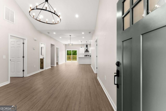 130 E Railroad Ave, Alto, GA 30510 - entrance foyer featuring a chandelier, dark wood-type flooring, recessed lighting, and a towering ceiling