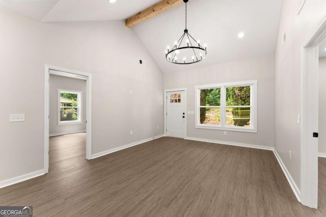 130 E Railroad Ave, Alto, GA 30510 - unfurnished living room featuring beamed ceiling, a chandelier, dark wood finished floors, and high vaulted ceiling