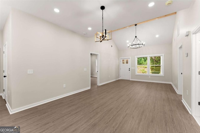 130 E Railroad Ave, Alto, GA 30510 - unfurnished living room with a chandelier, wood finished floors, recessed lighting, and high vaulted ceiling