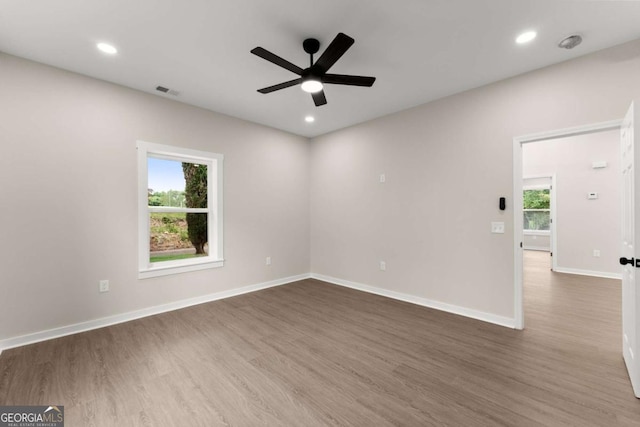 130 E Railroad Ave, Alto, GA 30510 - spare room with ceiling fan, dark wood-type flooring, and recessed lighting