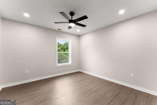 130 E Railroad Ave, Alto, GA 30510 - spare room with dark wood finished floors, ceiling fan, and recessed lighting