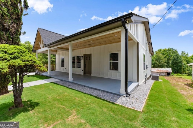 130 E Railroad Ave, Alto, GA 30510 - back of house with a patio, a yard, roof with shingles, and board and batten siding