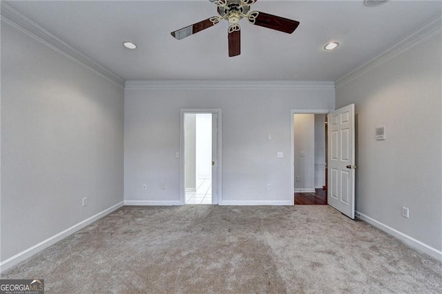 2324 Blackberry Ct, Snellville, GA 30078 - unfurnished bedroom featuring ornamental molding, carpet flooring, a ceiling fan, and recessed lighting