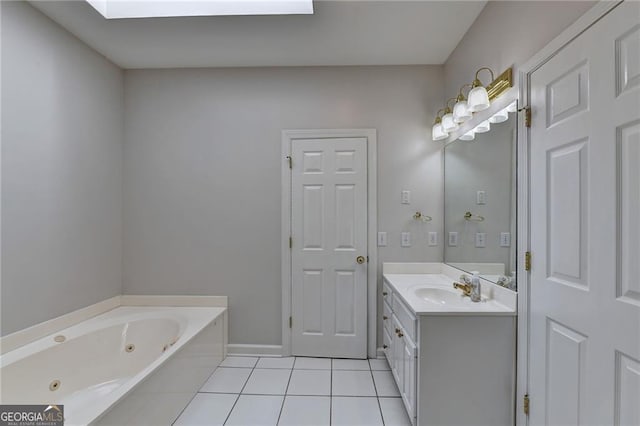 2324 Blackberry Ct, Snellville, GA 30078 - full bath featuring vanity, tile patterned floors, and a tub with jets