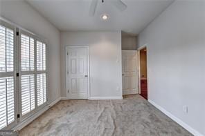 2324 Blackberry Ct, Snellville, GA 30078 - unfurnished bedroom with carpet and baseboards