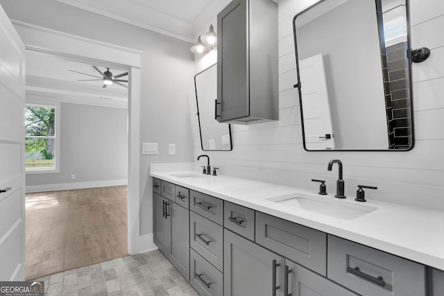 153 Alaina Rd, Holly Springs, GA 30115 - full bathroom with ceiling fan, crown molding, double vanity, and wood finished floors