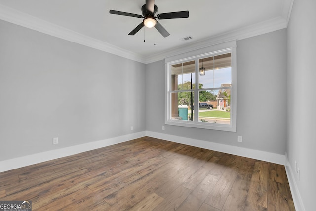 153 Alaina Rd, Holly Springs, GA 30115 - spare room featuring crown molding, hardwood / wood-style floors, and a ceiling fan