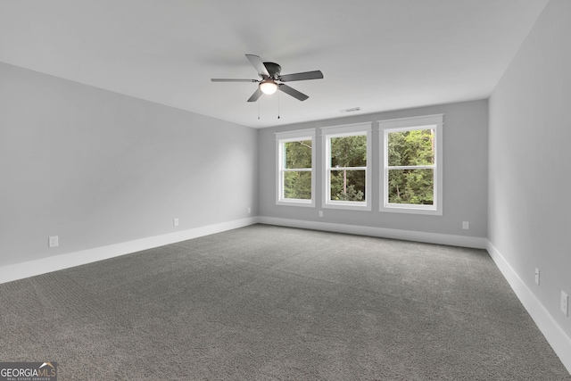 153 Alaina Rd, Holly Springs, GA 30115 - spare room with ceiling fan and carpet flooring