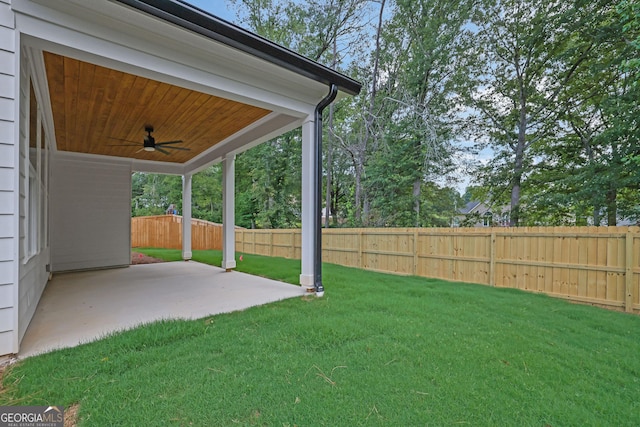 153 Alaina Rd, Holly Springs, GA 30115 - fenced backyard featuring ceiling fan and a patio area