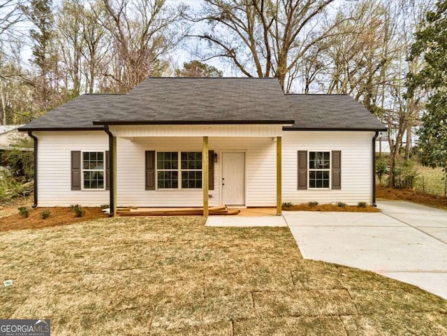 211 Loftis Rd, Temple, GA 30179 - view of front of property with a porch, a front yard, and roof with shingles