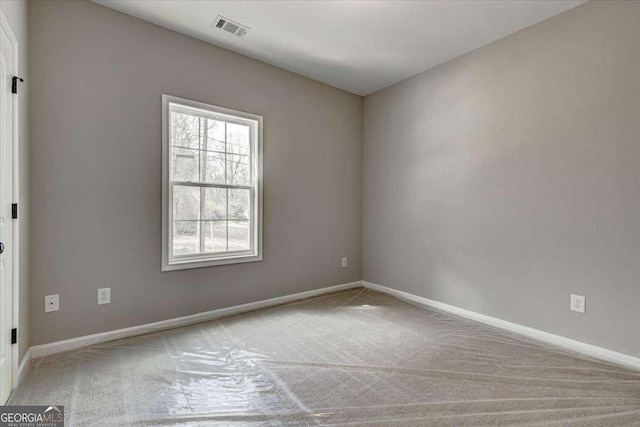 211 Loftis Rd, Temple, GA 30179 - carpeted spare room featuring baseboards