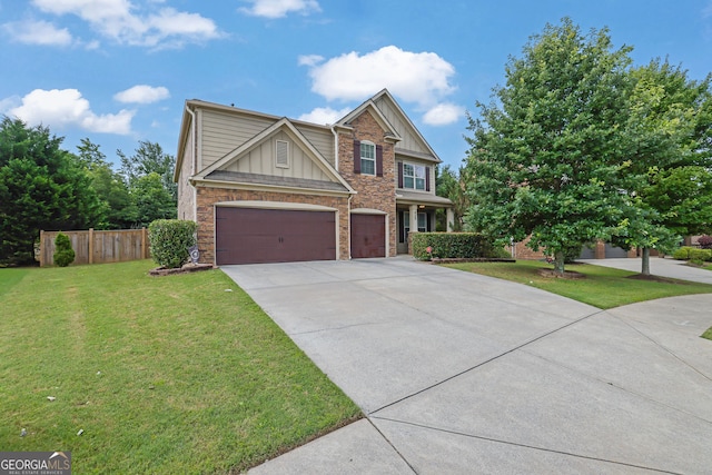 425 Eldridge Dr, Suwanee, GA 30024 - craftsman inspired home with an attached garage, concrete driveway, and stone siding