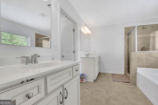 425 Eldridge Dr, Suwanee, GA 30024 - full bathroom with a stall shower, two vanities, a bath, and tile patterned floors