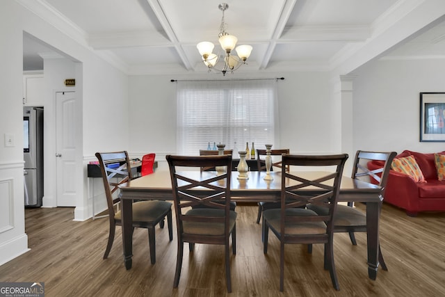 425 Eldridge Dr, Suwanee, GA 30024 - dining area featuring a chandelier, dark wood-type flooring, coffered ceiling, beamed ceiling, and wainscoting