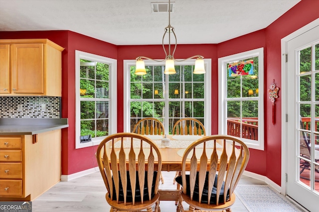 52 Cherub Ln, Sharpsburg, GA 30277 - dining area featuring light wood finished floors and baseboards