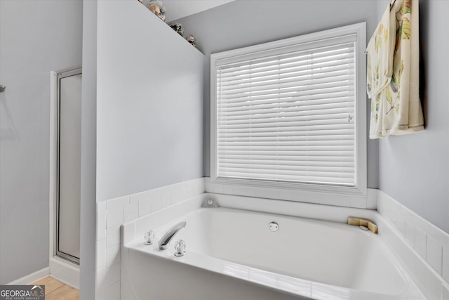 52 Cherub Ln, Sharpsburg, GA 30277 - full bathroom with a bath and a shower stall