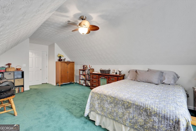 52 Cherub Ln, Sharpsburg, GA 30277 - carpeted bedroom with vaulted ceiling, ceiling fan, and a textured ceiling