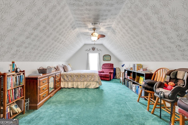 52 Cherub Ln, Sharpsburg, GA 30277 - bedroom with carpet flooring, lofted ceiling, a textured ceiling, and a ceiling fan