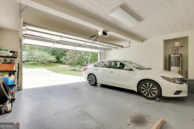 52 Cherub Ln, Sharpsburg, GA 30277 - garage with gas water heater and a garage door opener
