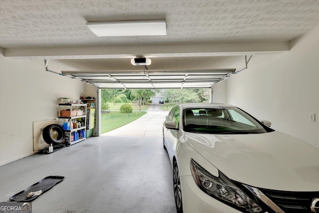 52 Cherub Ln, Sharpsburg, GA 30277 - garage featuring a garage door opener