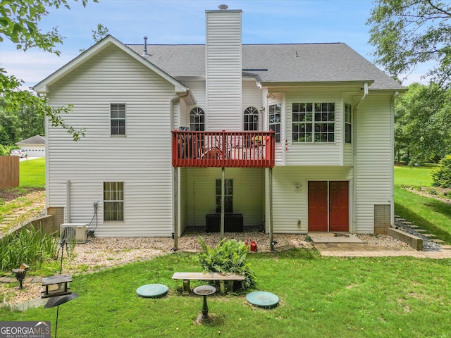 52 Cherub Ln, Sharpsburg, GA 30277 - rear view of property featuring a yard, a deck, and a chimney