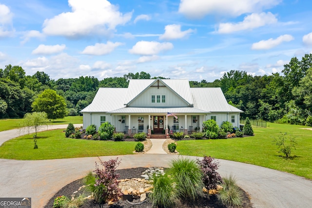 639 Frank Crook Rd, Canon, GA 30520 - modern inspired farmhouse with curved driveway, covered porch, board and batten siding, and a front yard