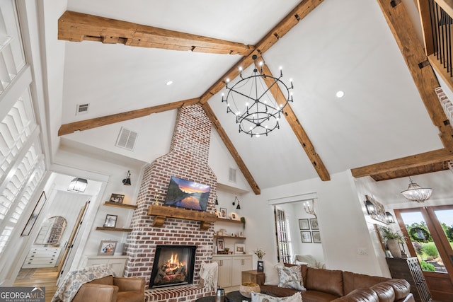 639 Frank Crook Rd, Canon, GA 30520 - living area featuring a chandelier, a towering ceiling, beam ceiling, and a brick fireplace