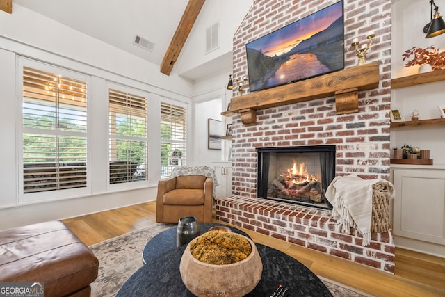 639 Frank Crook Rd, Canon, GA 30520 - living room with wood finished floors and a brick fireplace