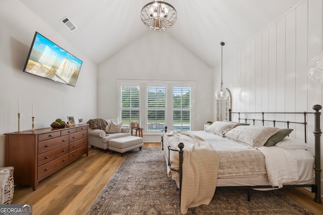 639 Frank Crook Rd, Canon, GA 30520 - bedroom with light wood finished floors, a chandelier, and high vaulted ceiling